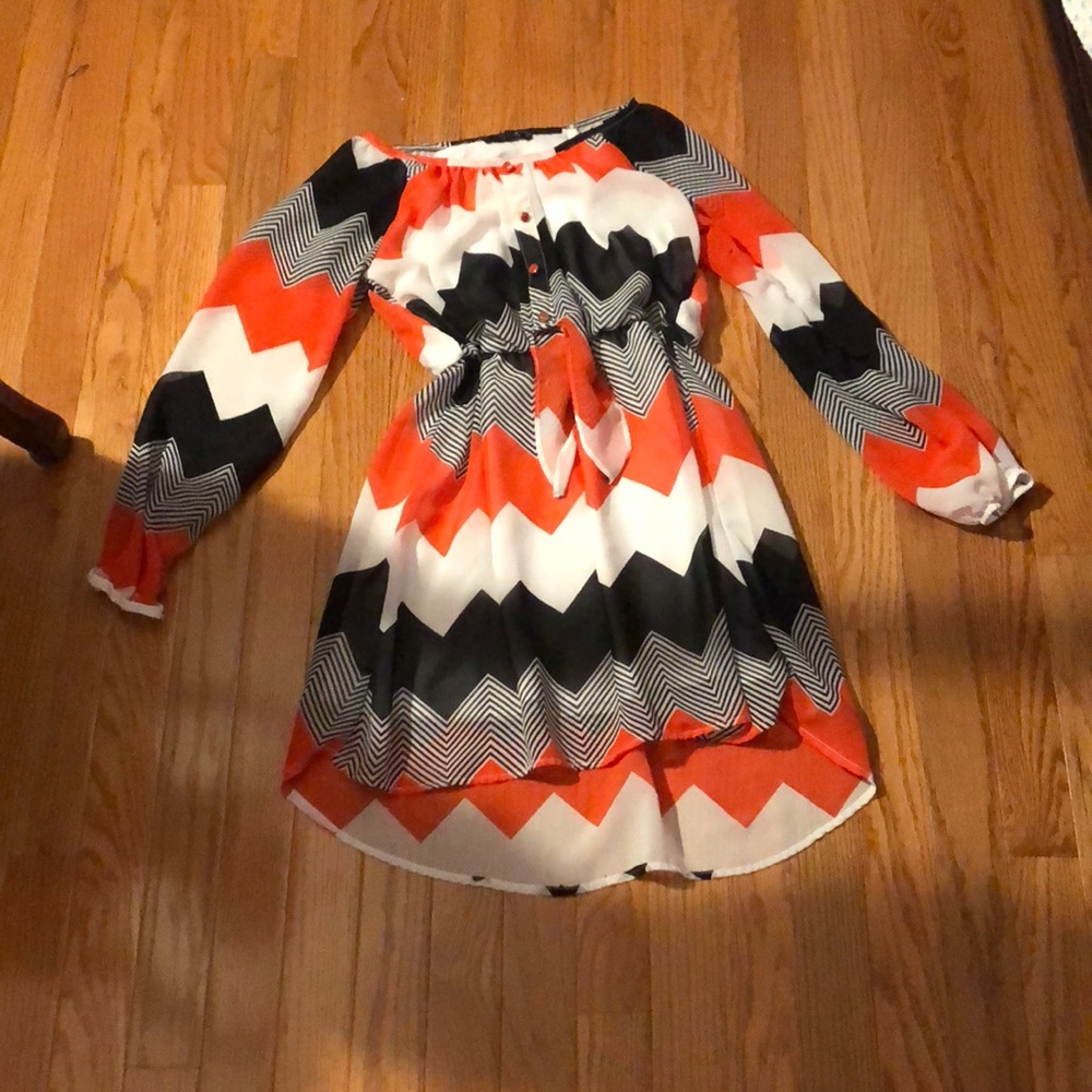 A blouse style knee length dress